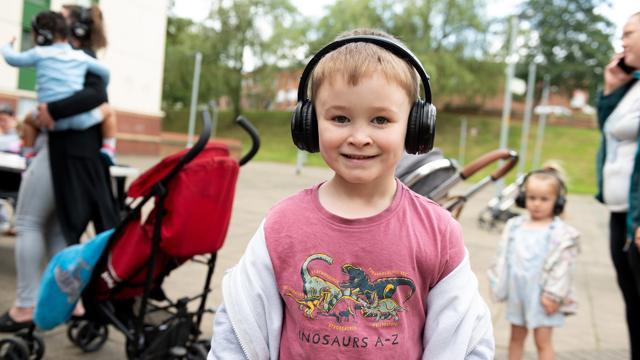 Young Boy At Community Event